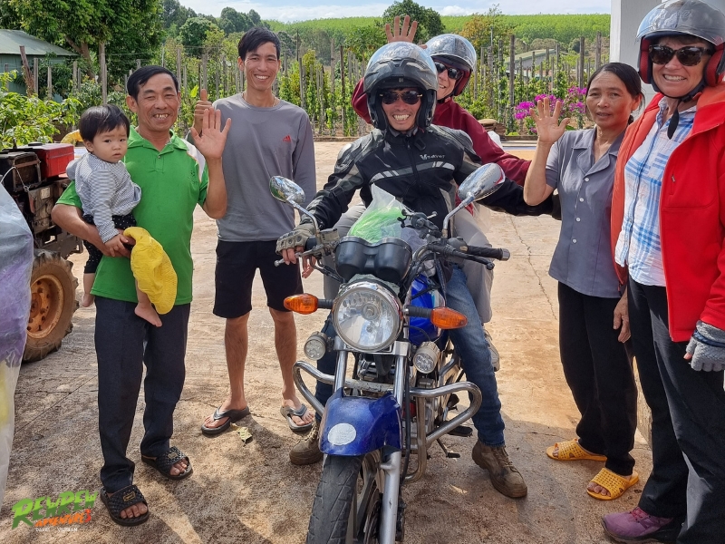 Guests with a motorbike on the Da Lat to Nha Trang Easy Rider motorbike tour